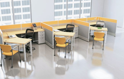 a linear arrangement of three cubicles with additional seating for a guest